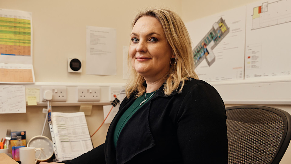 Woman working on her desk