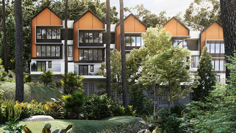 Apartment complex with a garden around it